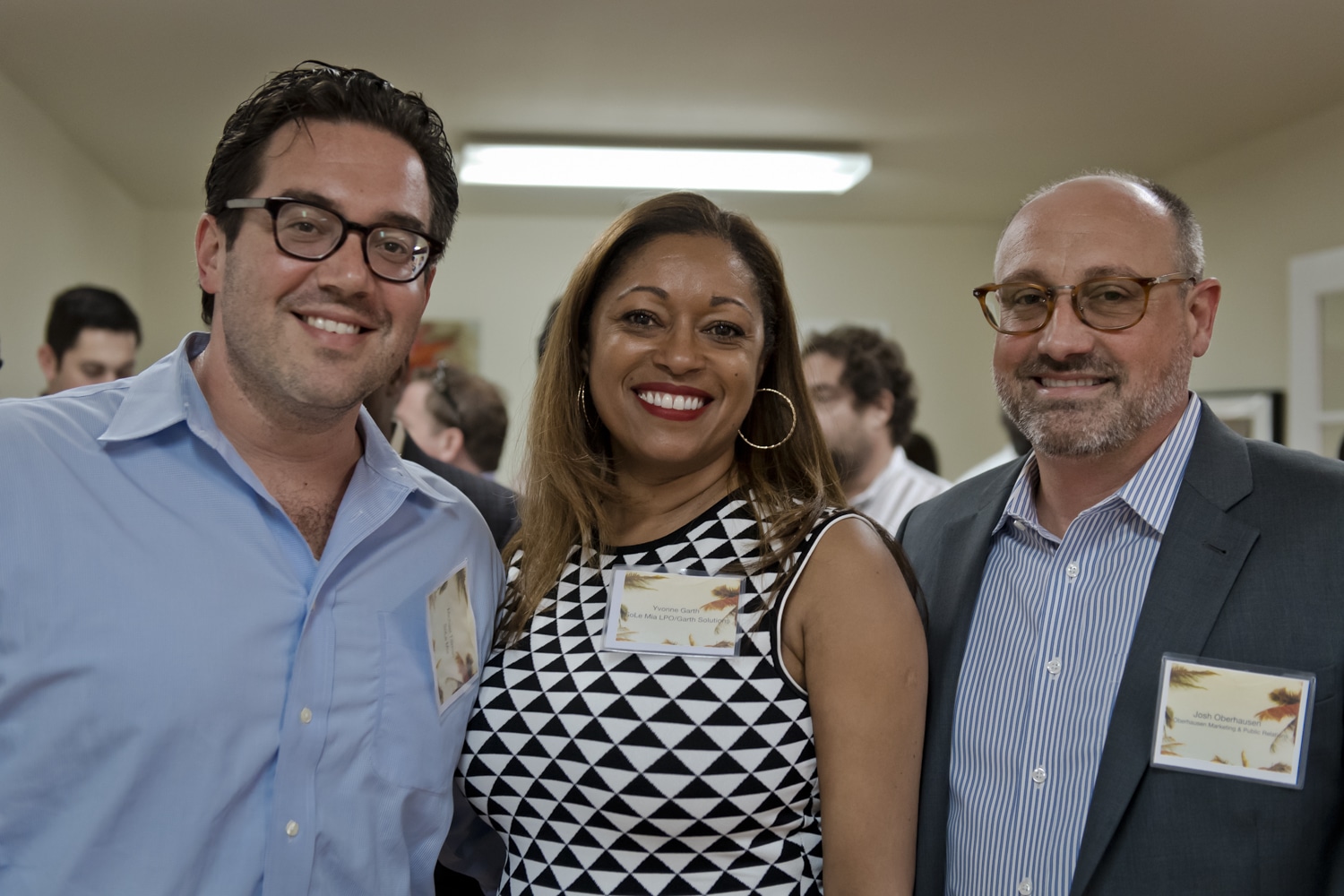 Josh Oberhausen with SoLe Mia developer Michael Tillman and Garth Solutions President Yvonne Garth